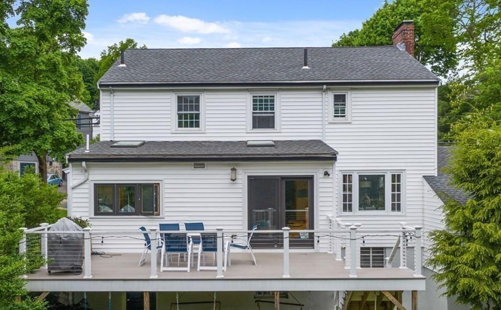 41 Lila Road Boston, MA 02130 - Photo 26 of 39 a view of white house with large windows and a large tree