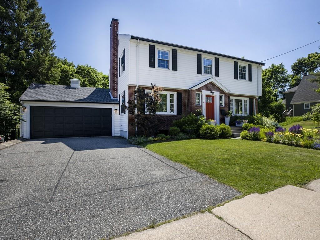 41 Lila Road Boston, MA 02130 - Photo 37 of 39 a front view of a house with garden