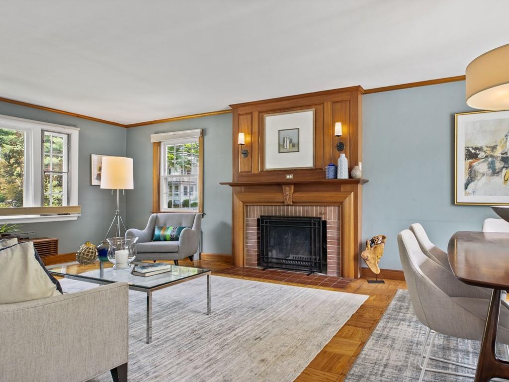 41 Lila Road Boston, MA 02130 - Photo 4 of 39 a living room with furniture a window and a fireplace