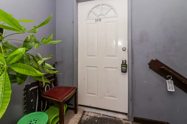 a view of bathroom with a potted plant