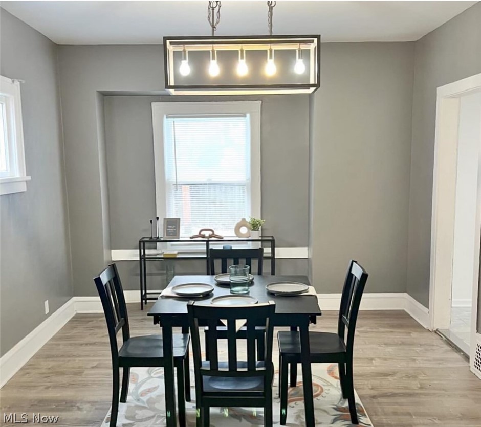 3550 Pennington Road Cleveland, OH 44120 - Photo 4 of 16 Dining space featuring light hardwood / wood-style floors