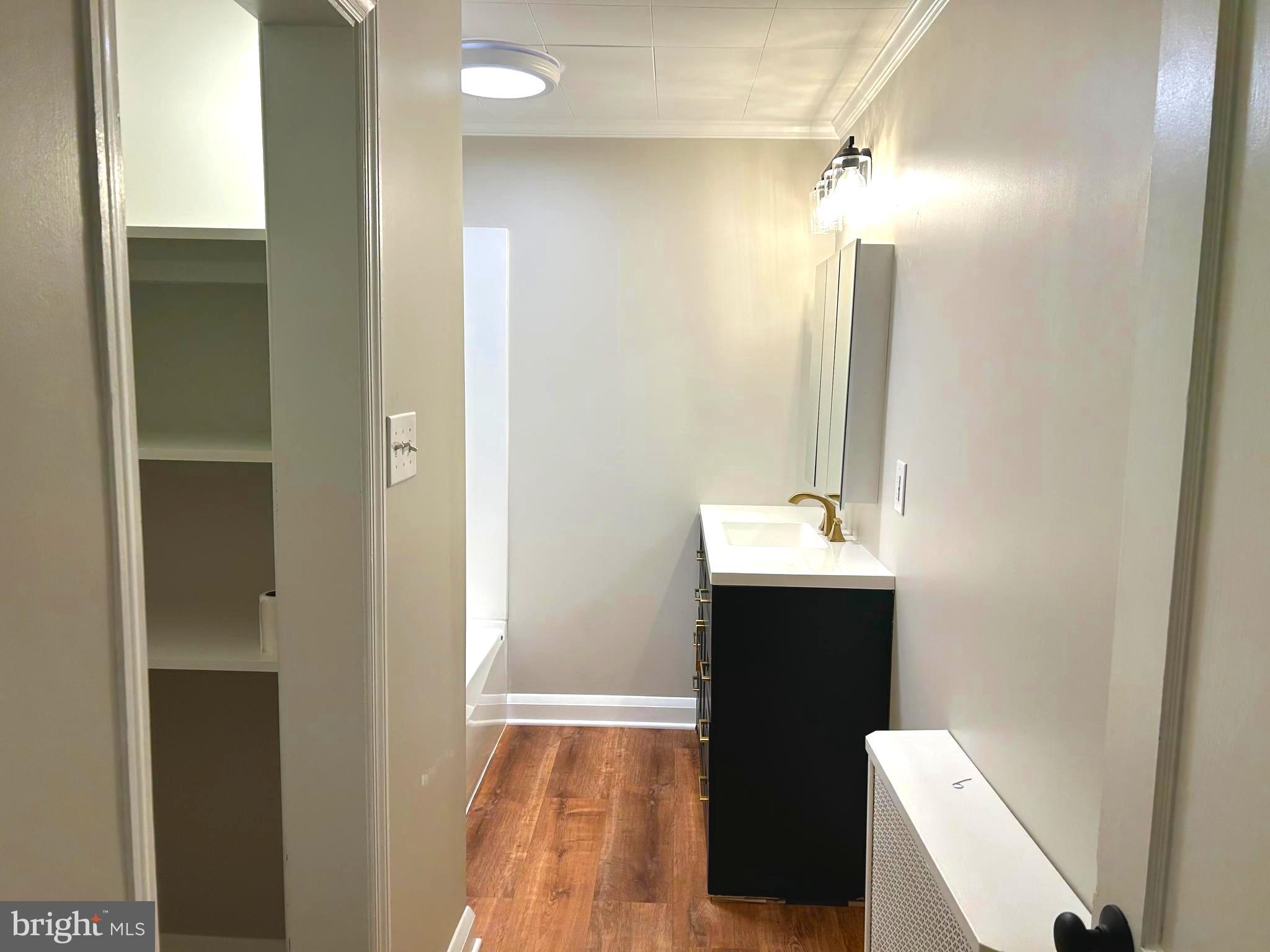 2244 Old Washington Road Westminster, MD 21157 - Photo 21 of 60 a bathroom with a sink and mirror