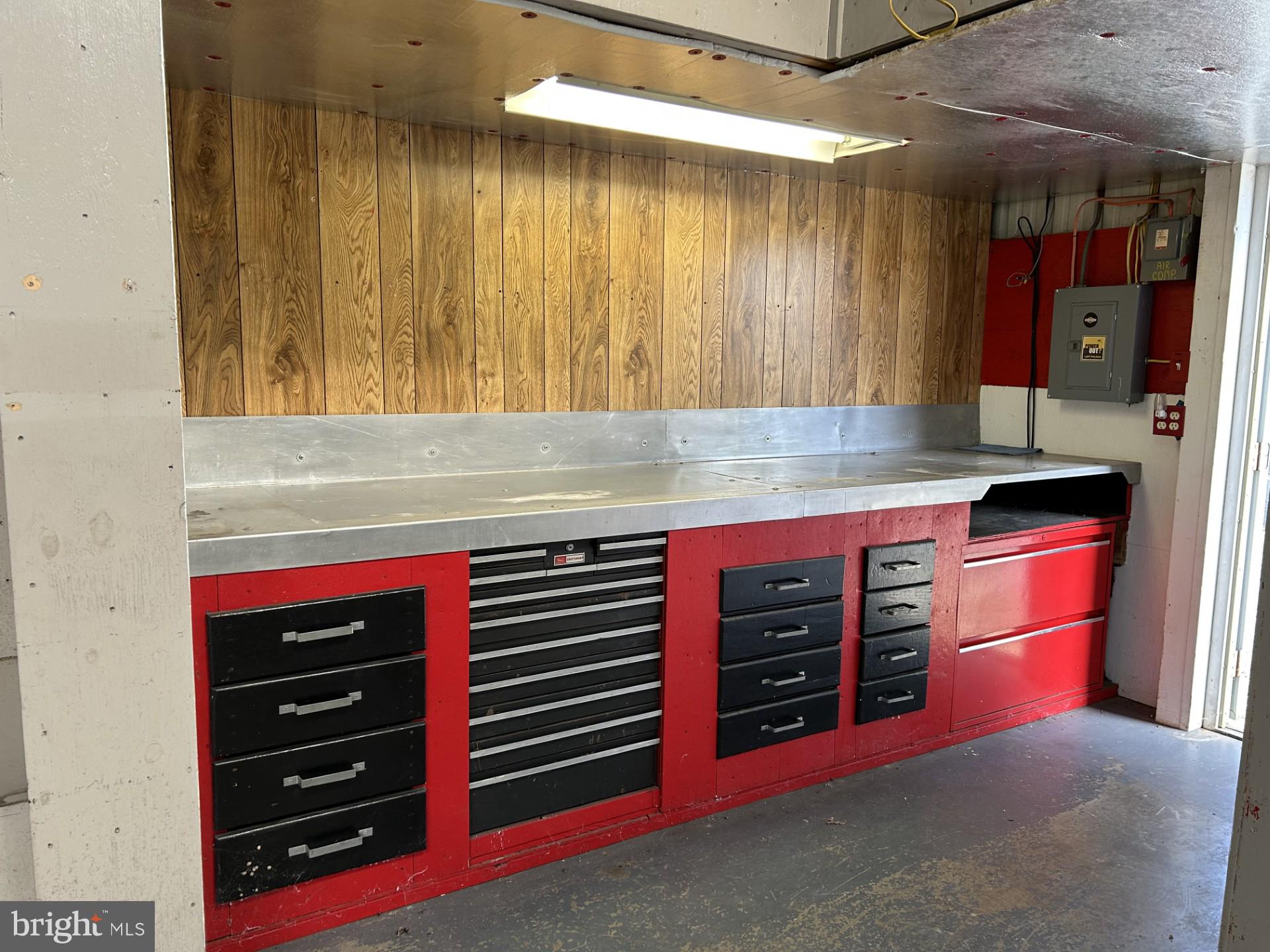 2244 Old Washington Road Westminster, MD 21157 - Photo 36 of 60 a kitchen with stainless steel appliances granite countertop a stove and a sink