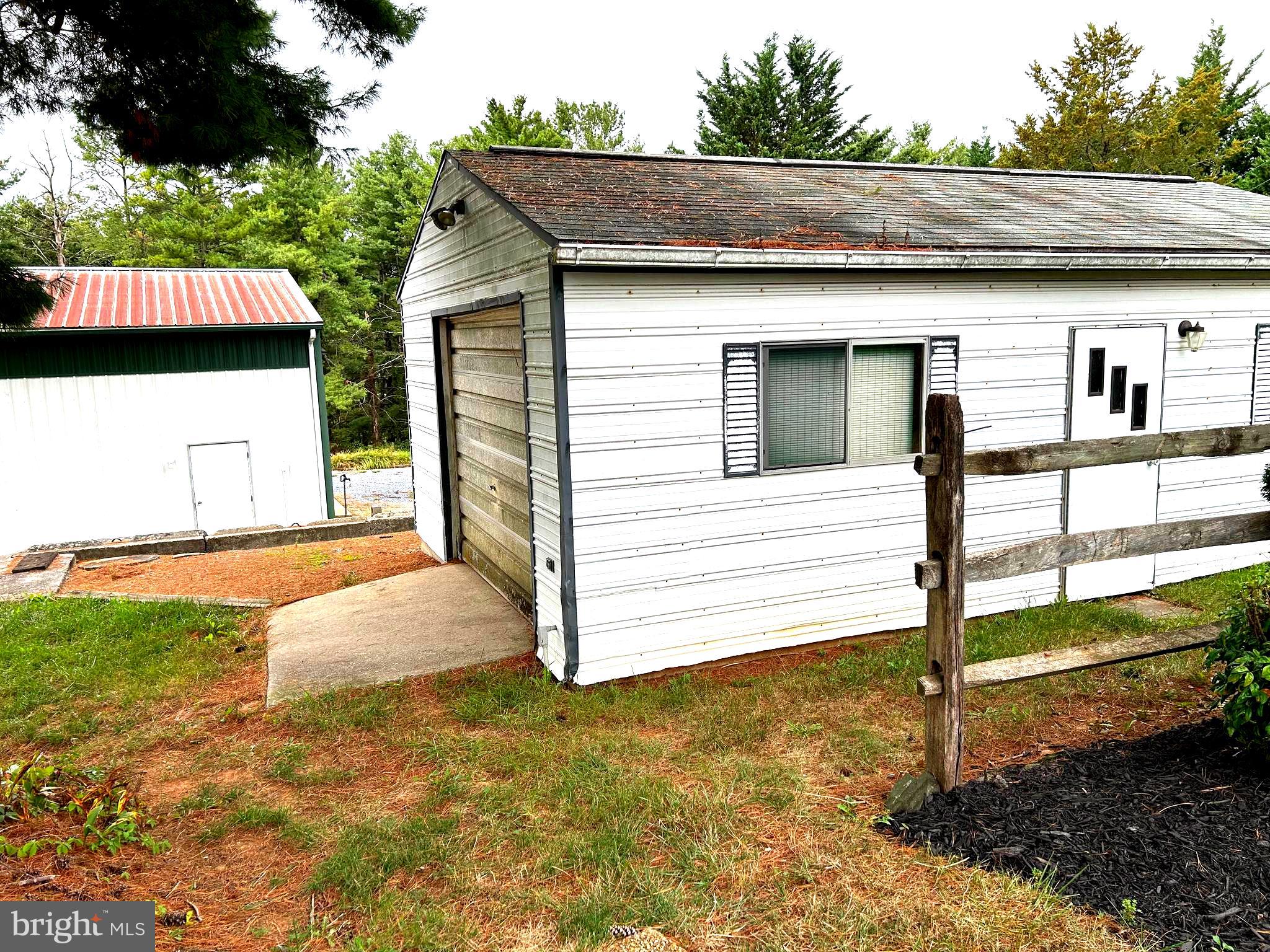 2244 Old Washington Road Westminster, MD 21157 - Photo 41 of 60 a view of a house with a yard