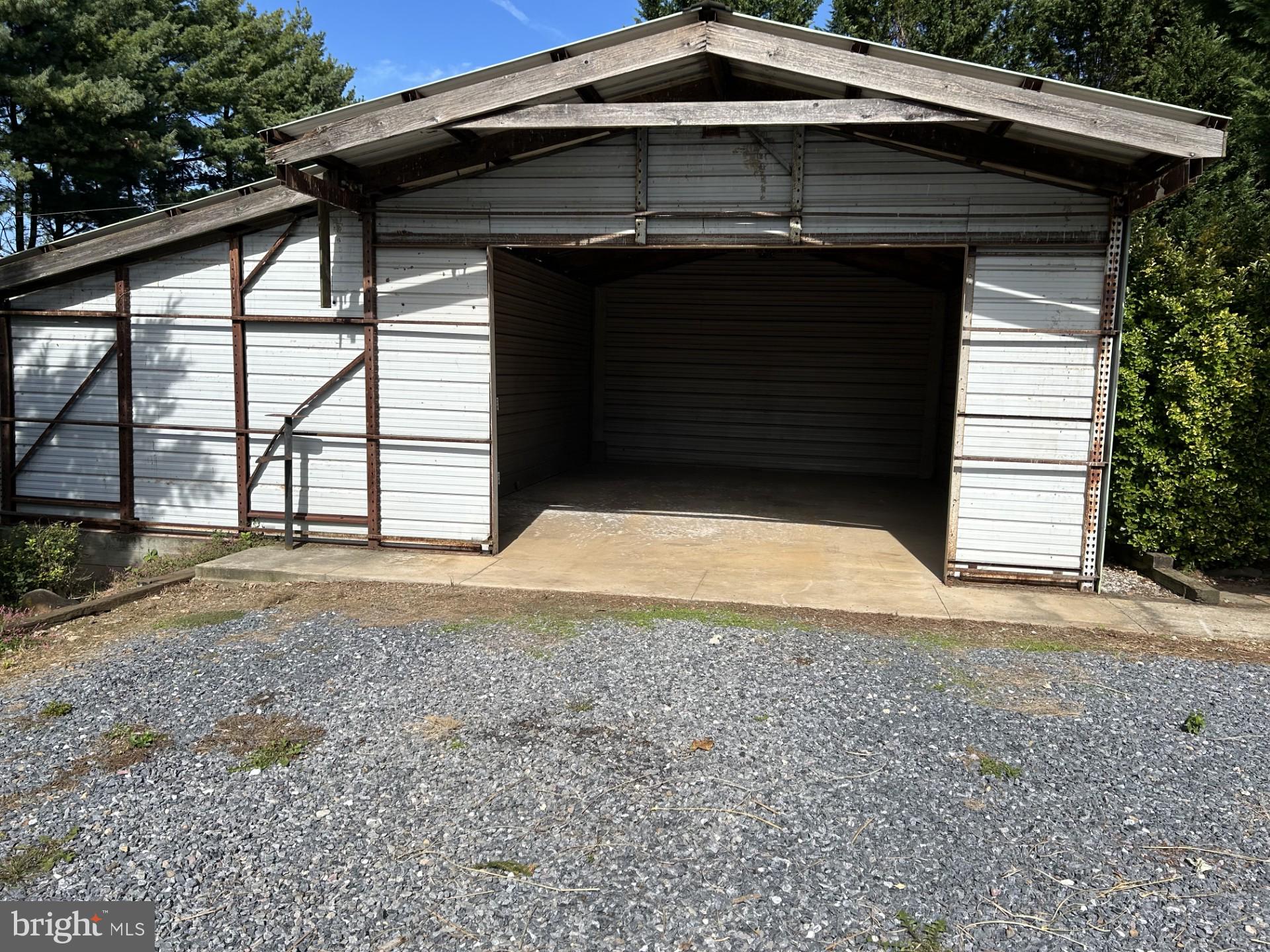 2244 Old Washington Road Westminster, MD 21157 - Photo 43 of 60 a front view of a house with a yard