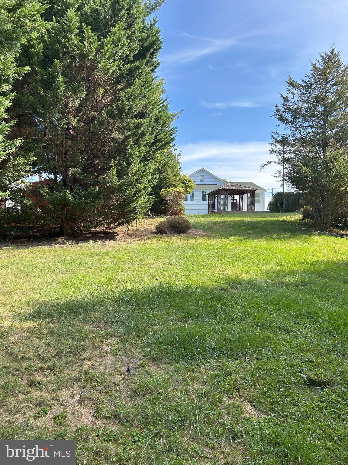 2244 Old Washington Road Westminster, MD 21157 - Photo 46 of 60 a view of a green yard with a house
