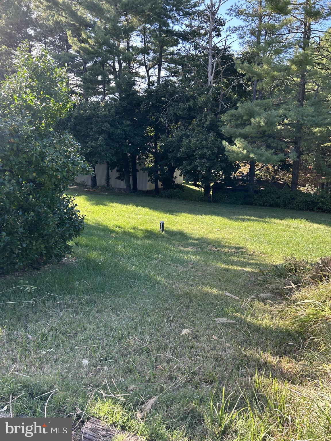 2244 Old Washington Road Westminster, MD 21157 - Photo 47 of 60 a view of a swimming pool with an outdoor space and seating area