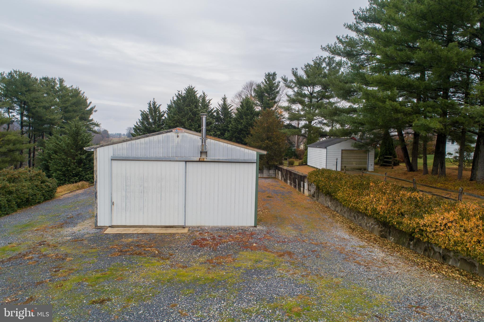 2244 Old Washington Road Westminster, MD 21157 - Photo 53 of 60 a backyard of a house with plants and trees