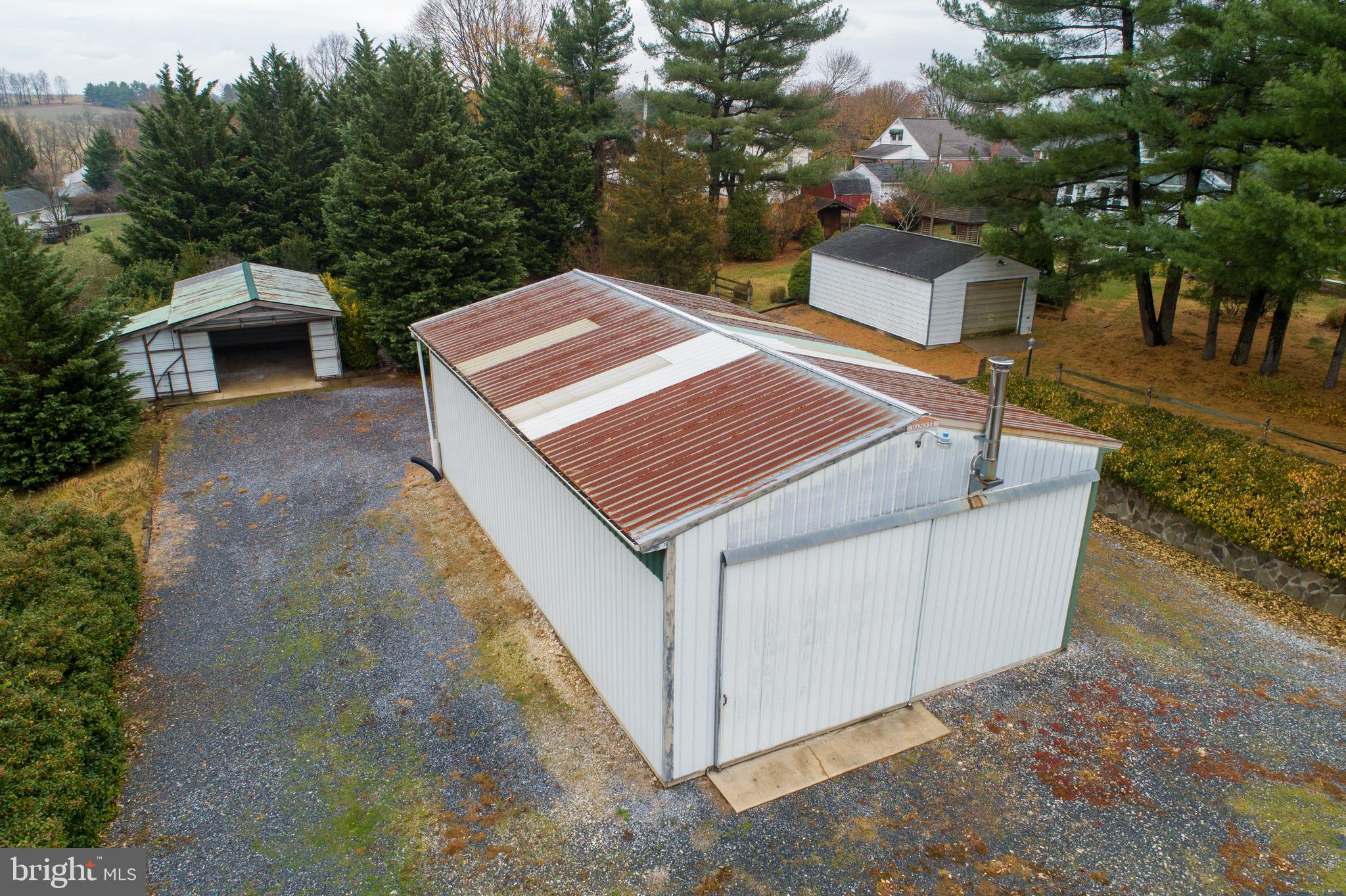2244 Old Washington Road Westminster, MD 21157 - Photo 54 of 60 a view of a house with a backyard and trees