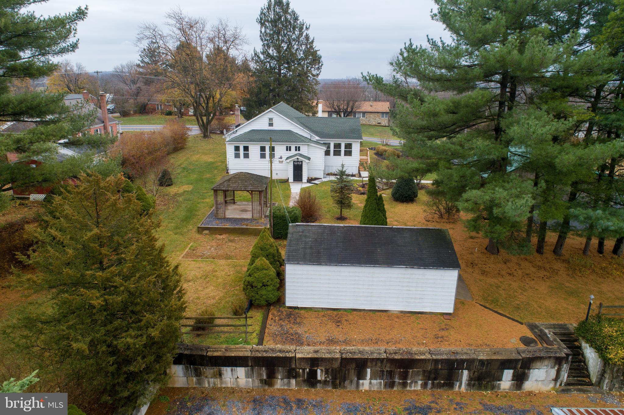 2244 Old Washington Road Westminster, MD 21157 - Photo 56 of 60 a front view of a house with a yard