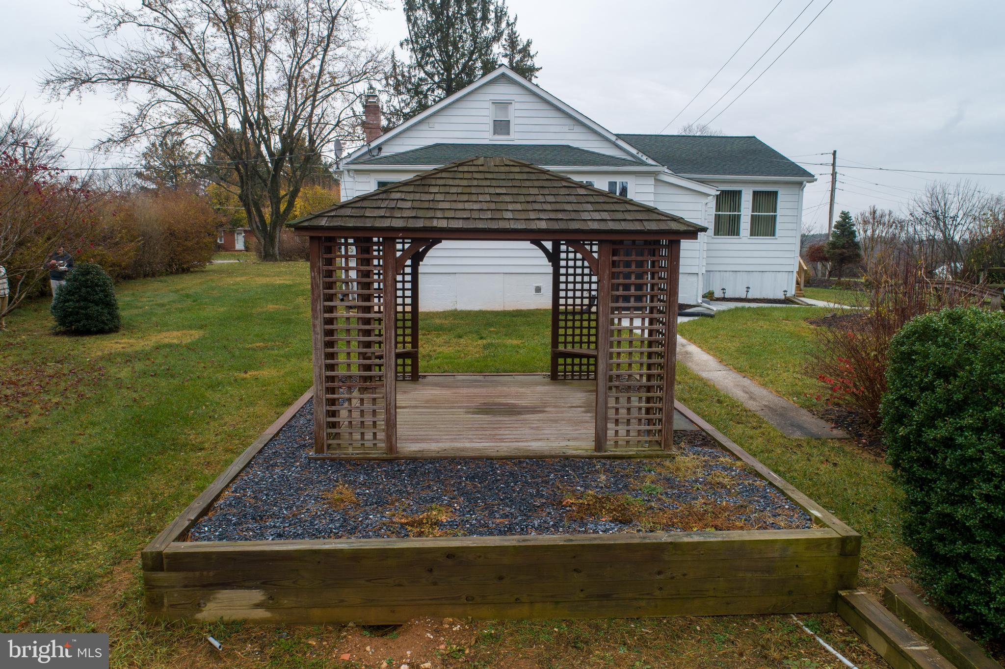 2244 Old Washington Road Westminster, MD 21157 - Photo 57 of 60 a front view of a house with garden