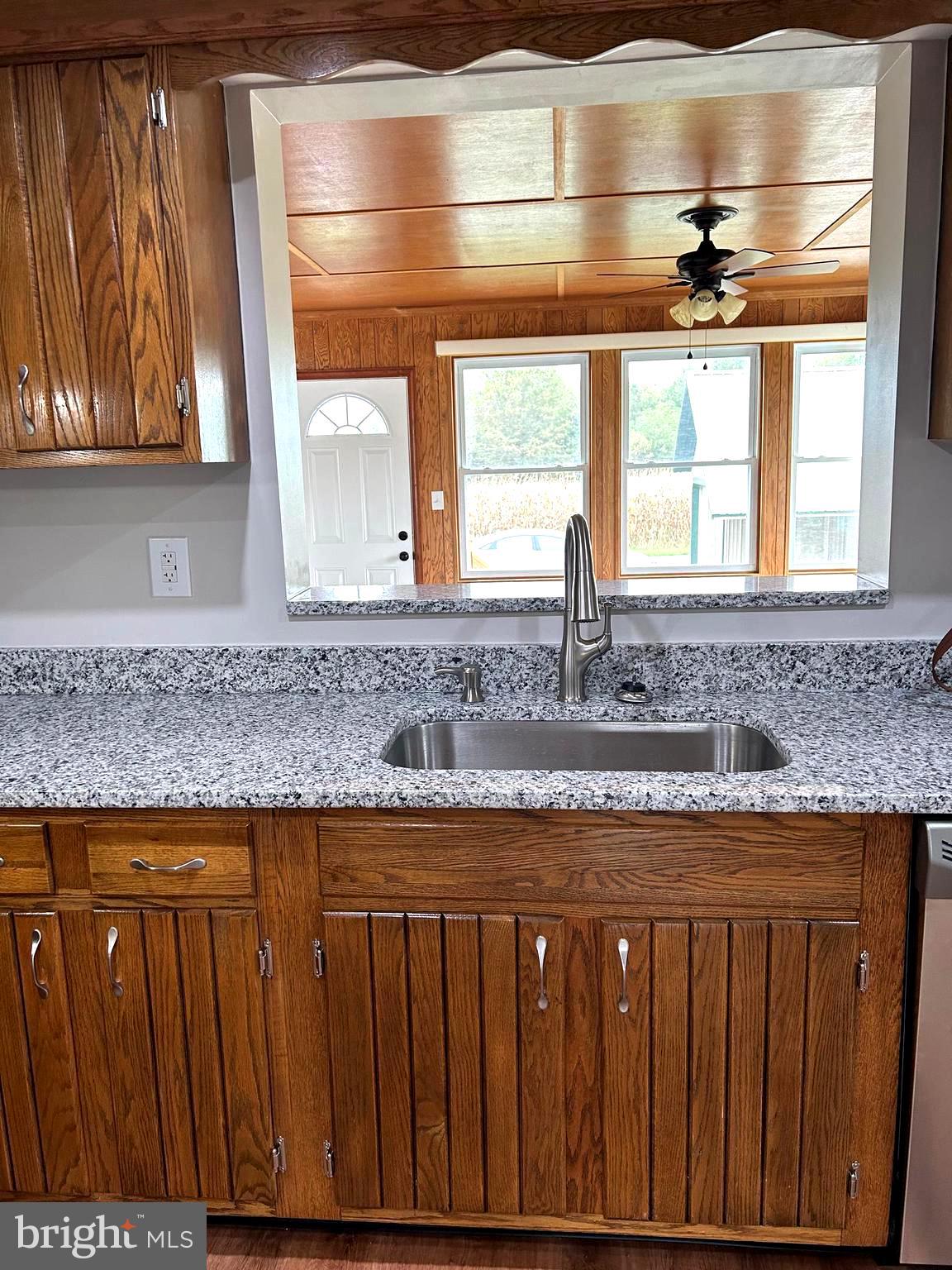 2244 Old Washington Road Westminster, MD 21157 - Photo 7 of 60 a kitchen with granite countertop a sink and a window