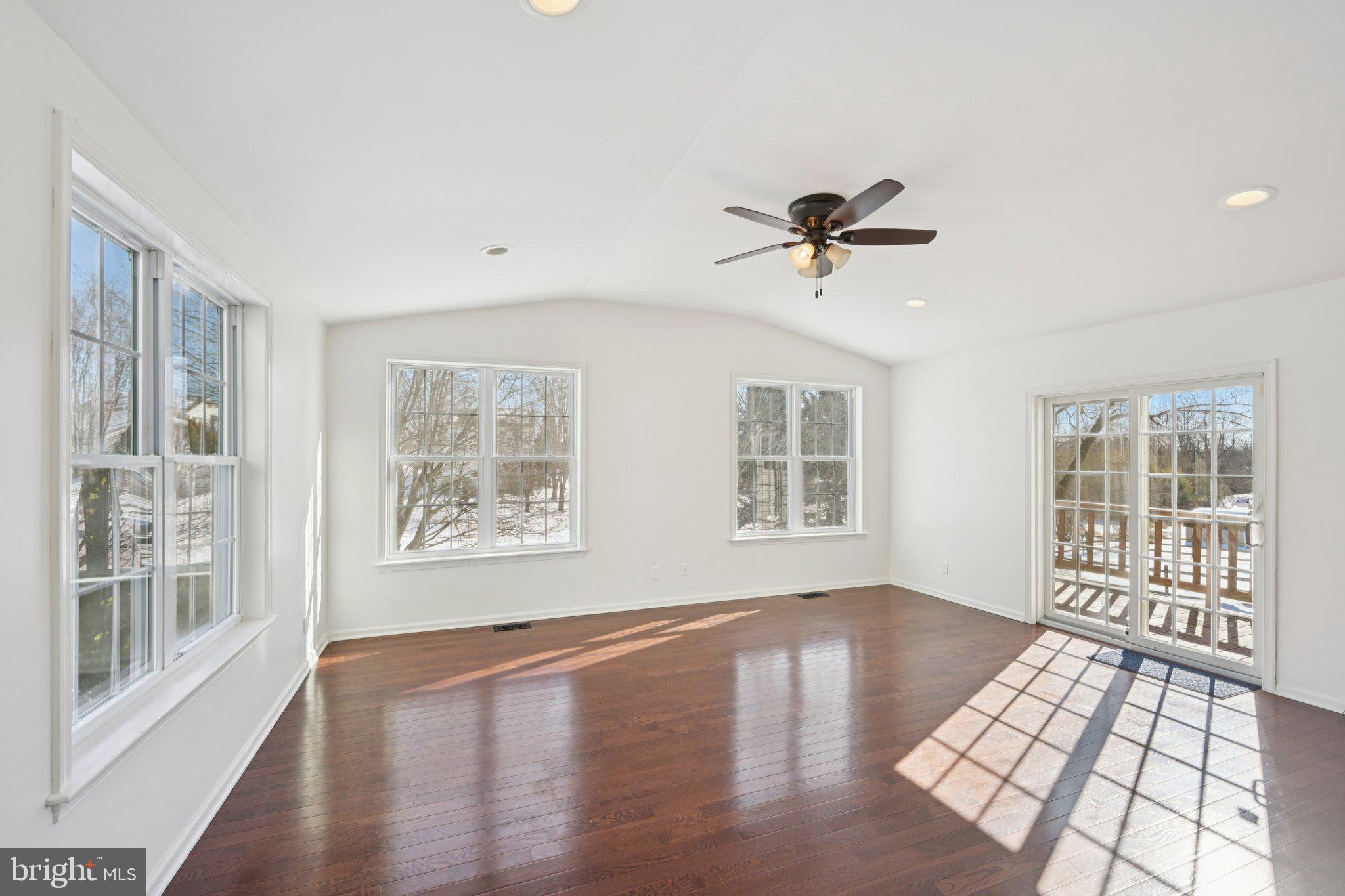 616 Stewart Road Collegeville, PA 19426 - Photo 16 of 56 a view of an empty room with a window and wooden floor