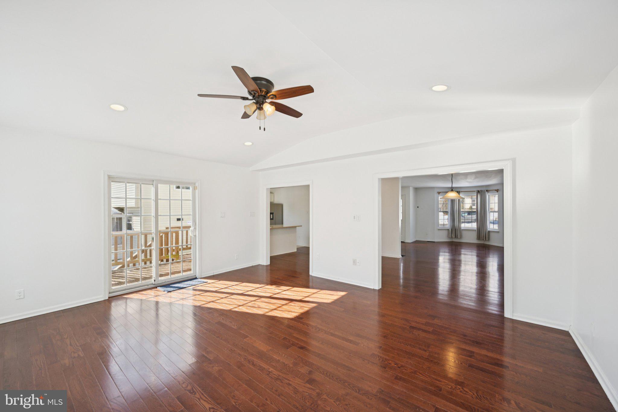 616 Stewart Road Collegeville, PA 19426 - Photo 17 of 56 an empty room with wooden floor and windows