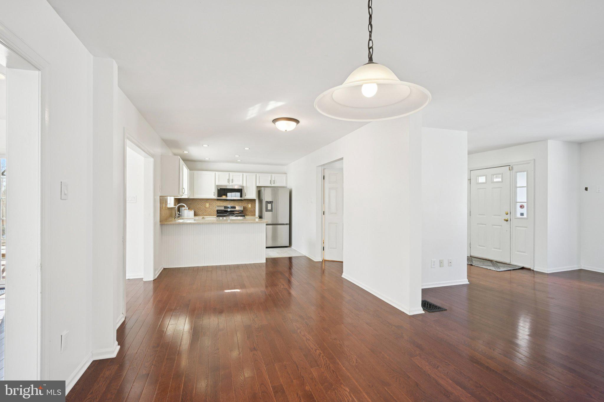 616 Stewart Road Collegeville, PA 19426 - Photo 19 of 56 a view of a kitchen with wooden floor and a kitchen