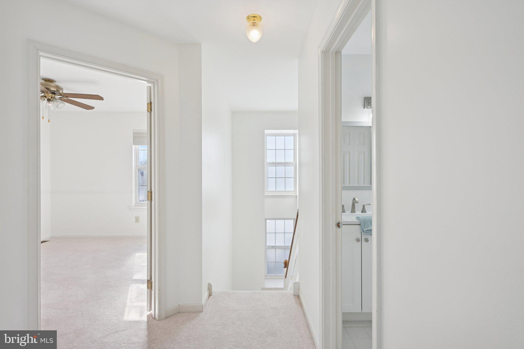 616 Stewart Road Collegeville, PA 19426 - Photo 24 of 56 a view of a bathroom from a hallway