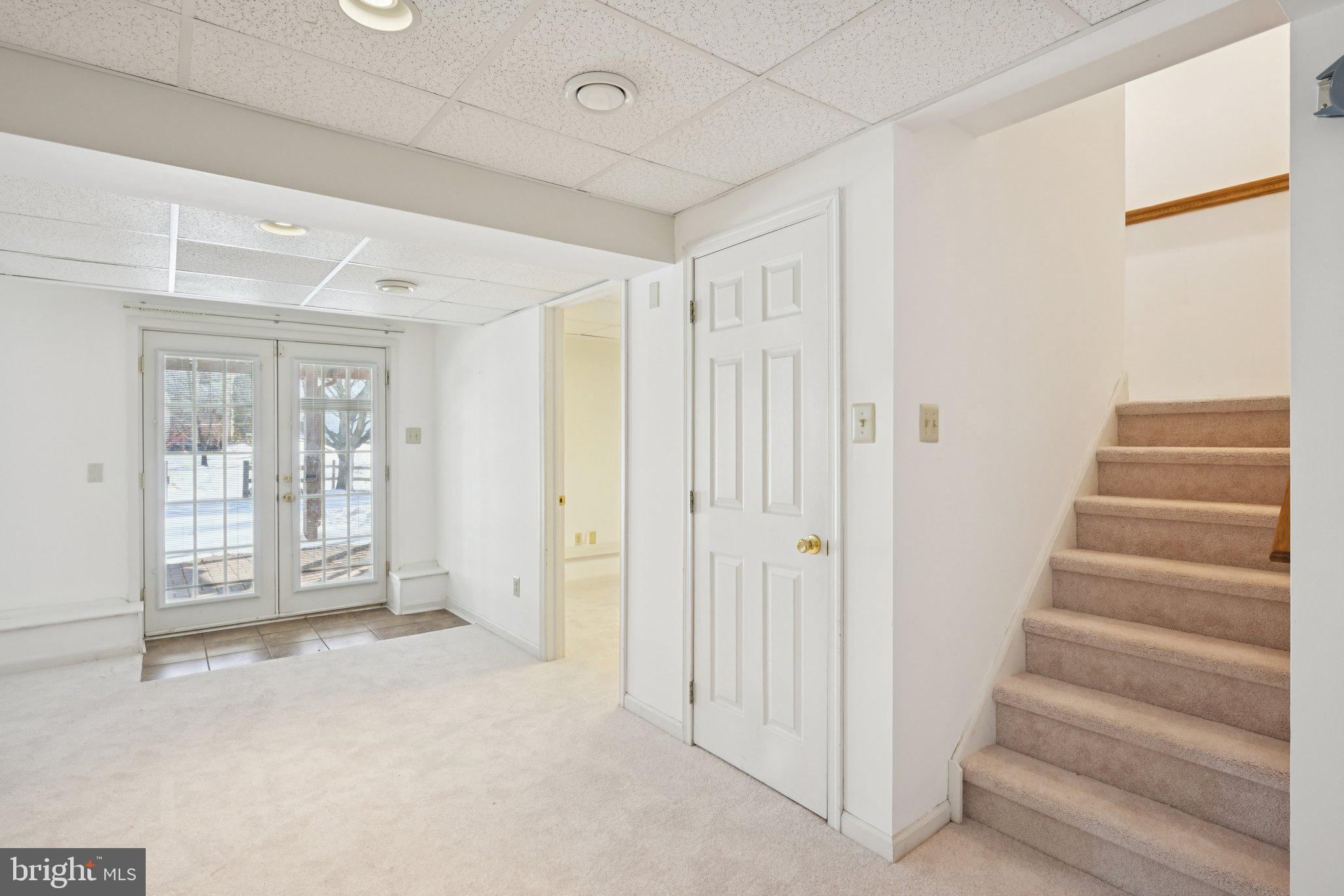 616 Stewart Road Collegeville, PA 19426 - Photo 37 of 56 a view of an empty room with wooden floor and a window