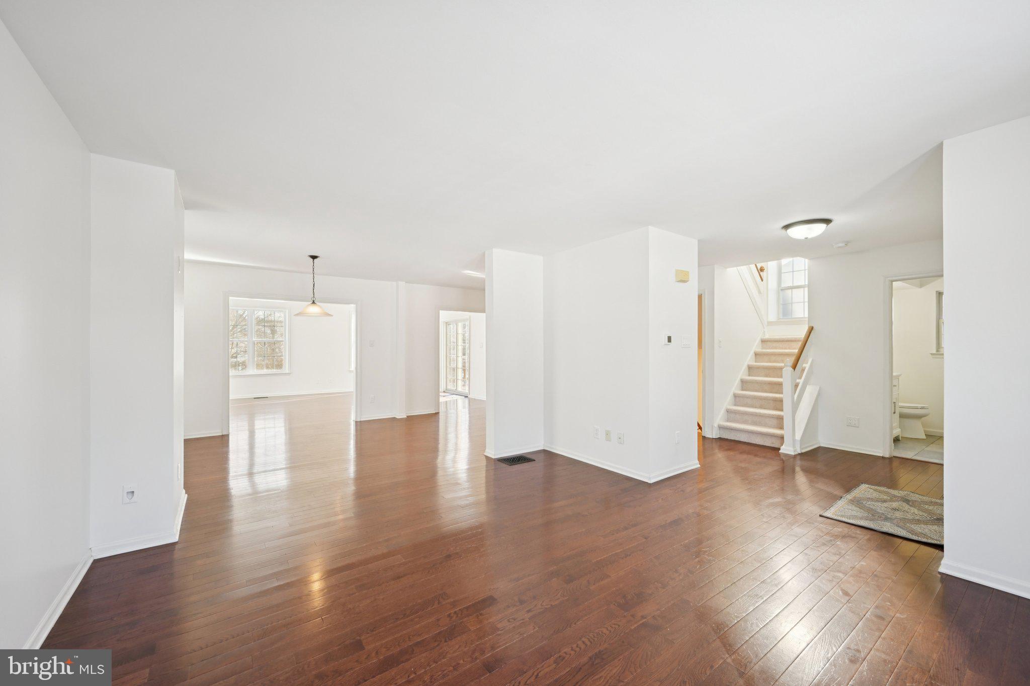 616 Stewart Road Collegeville, PA 19426 - Photo 9 of 56 a view of a kitchen with wooden floor and a refrigerator
