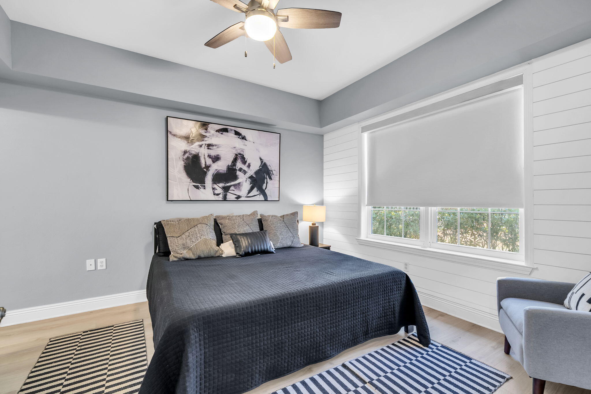 117 Village Boulevard, Unit 711 Santa Rosa Beach, FL 32459 - Photo 22 of 47 a bedroom with a large bed couch and a window