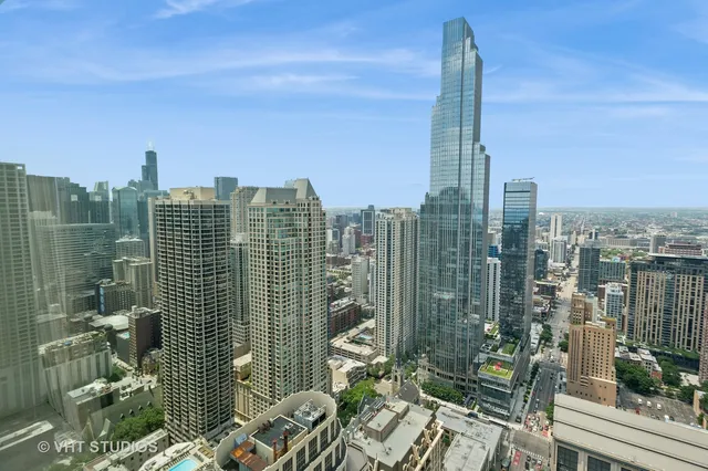 a view of a city with tall buildings