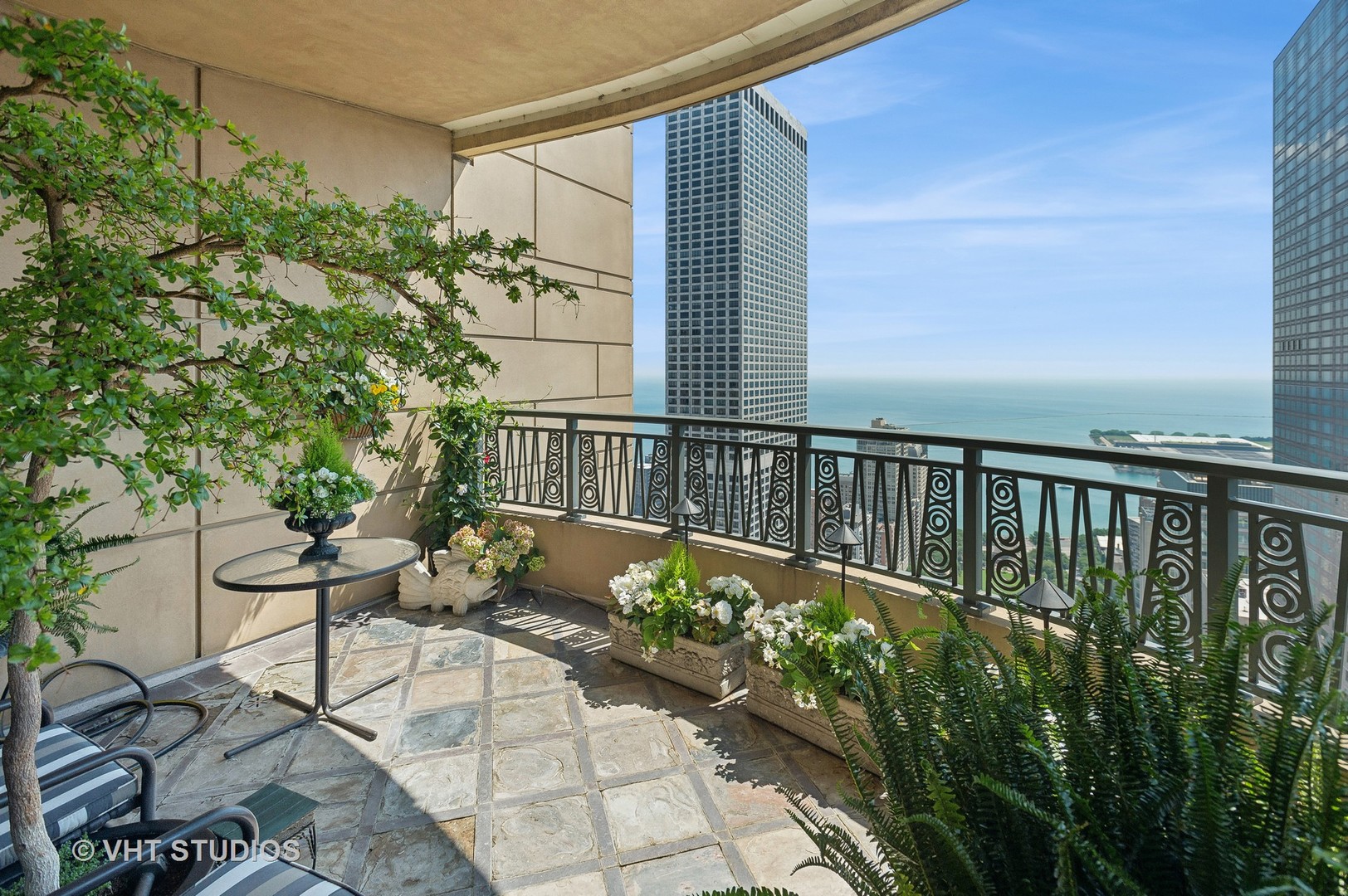 800 North Michigan Avenue, Unit 4702 Chicago, IL 60611 - Photo 5 of 31 a view of a balcony with chairs