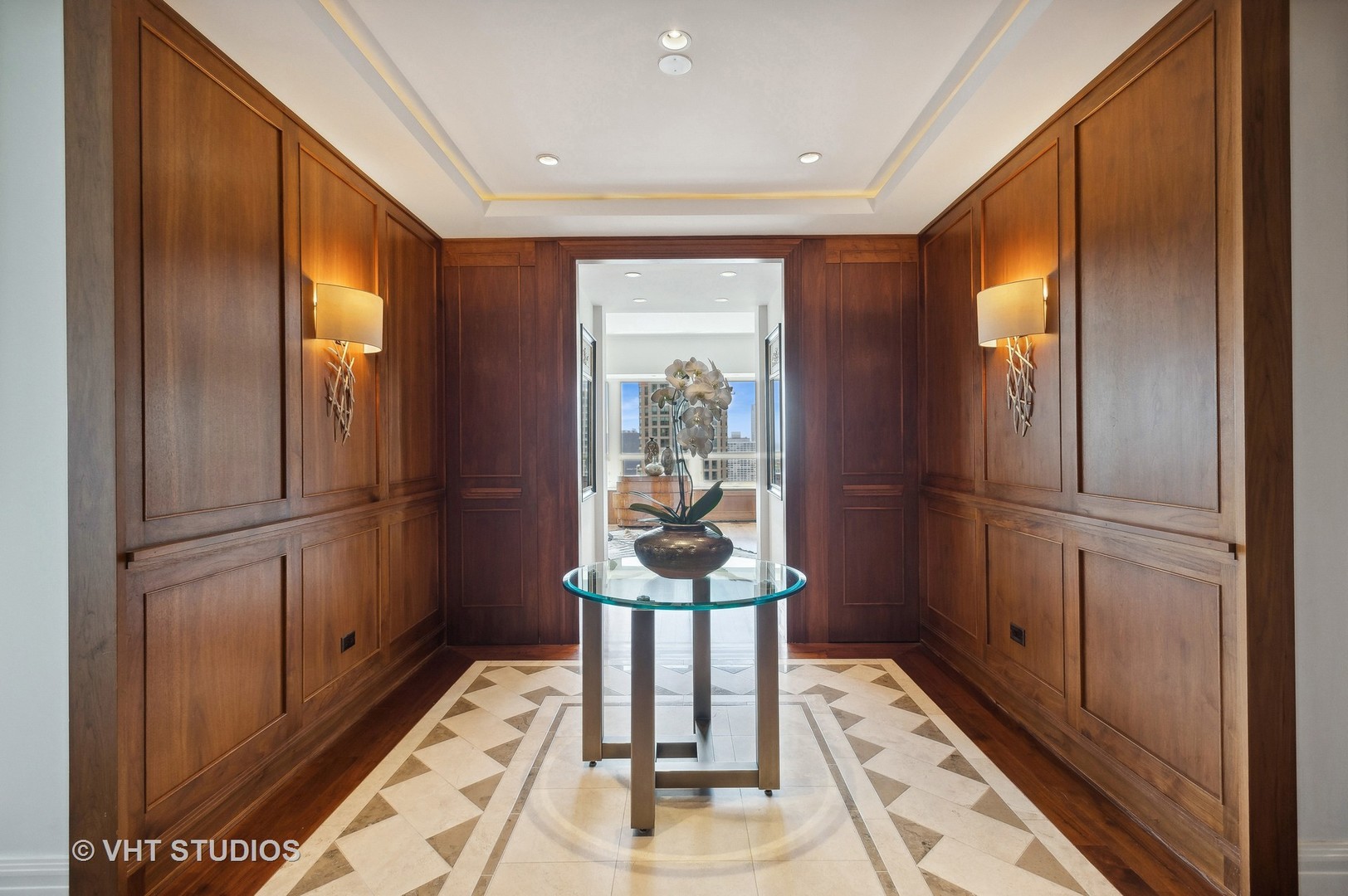 800 North Michigan Avenue, Unit 4702 Chicago, IL 60611 - Photo 7 of 31 a very nice looking room with a large window and wooden floor