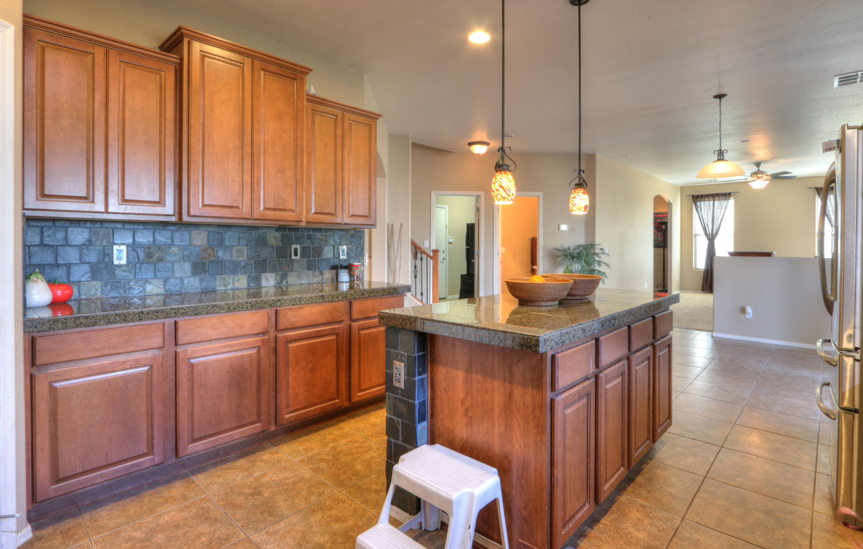 45682 West Mountain View Road Maricopa, AZ 85139 - Photo 19 of 46 Kitchen facing Dinning room