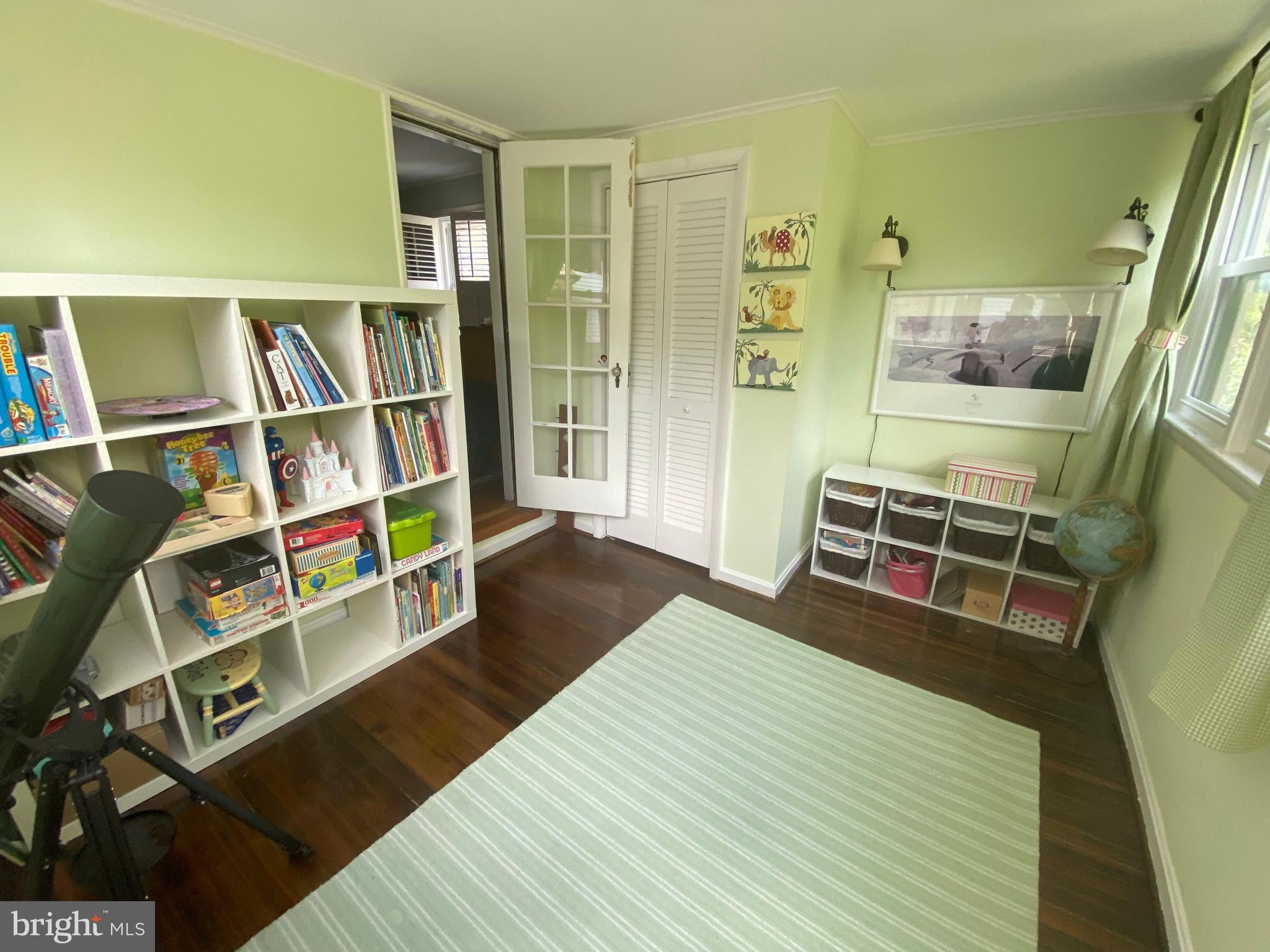 1417 44th Street Northwest Washington, DC 20007 - Photo 23 of 31 Sun Room/Playroom overlooking backyard