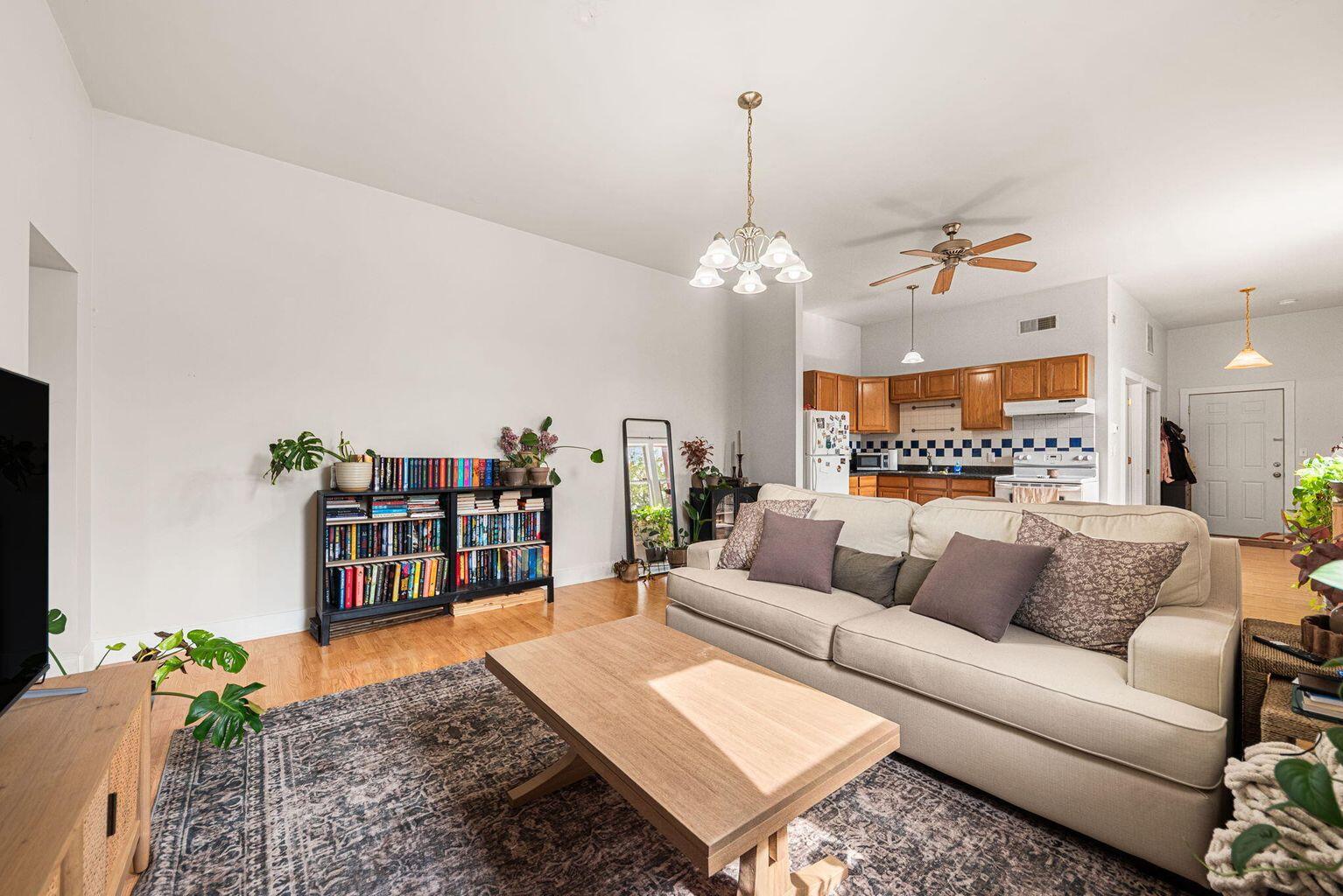 525 Franklin Street, Unit 3 Michigan City, IN 46360 - Photo 2 of 8 a living room with furniture and a table