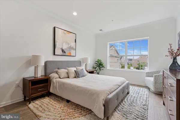 a bed room with a bed and a couch