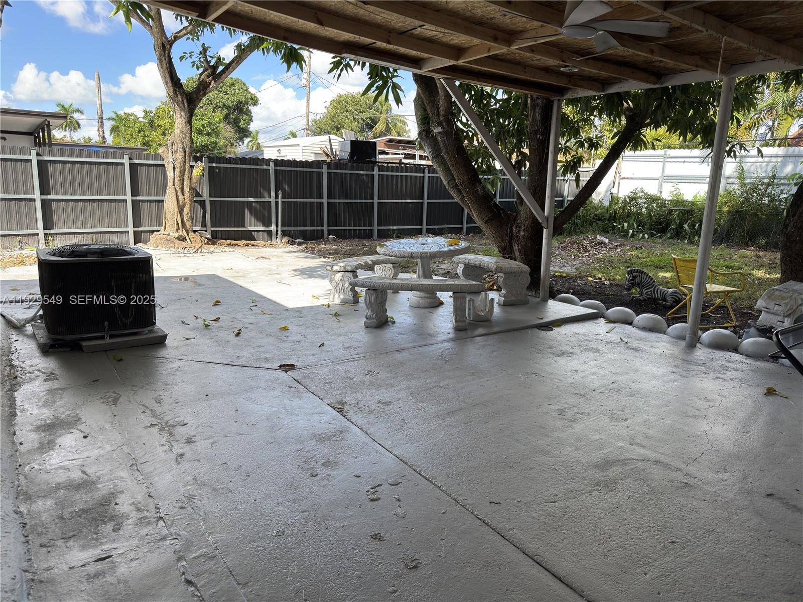 343 West 42nd Street, Unit A Hialeah, FL 33012 - Photo 7 of 13 a view of roof with sitting area
