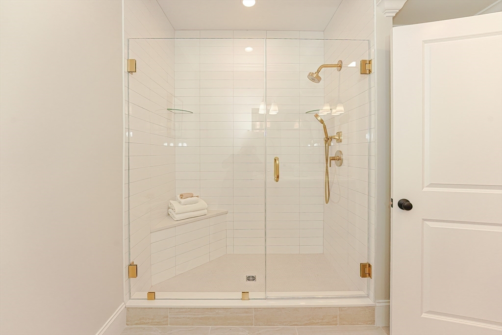 3 Damon Road, Unit 12 Needham Heights, MA 02494 - Photo 15 of 16 a bathroom with a shower