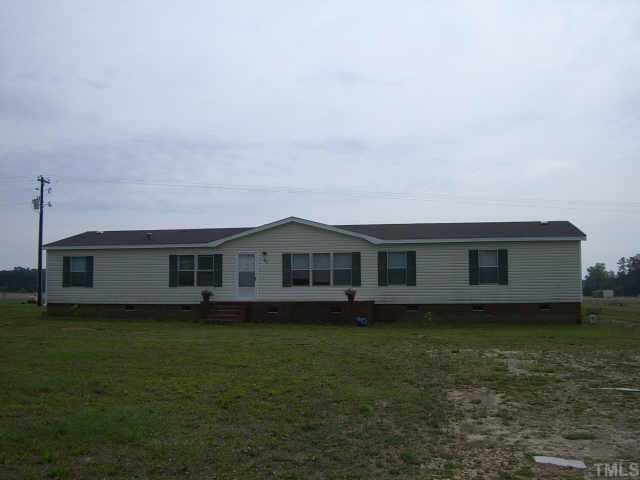 82 North Spring Branch Road Dunn, NC 28334 - Photo 2 of 2 a house with a garden space