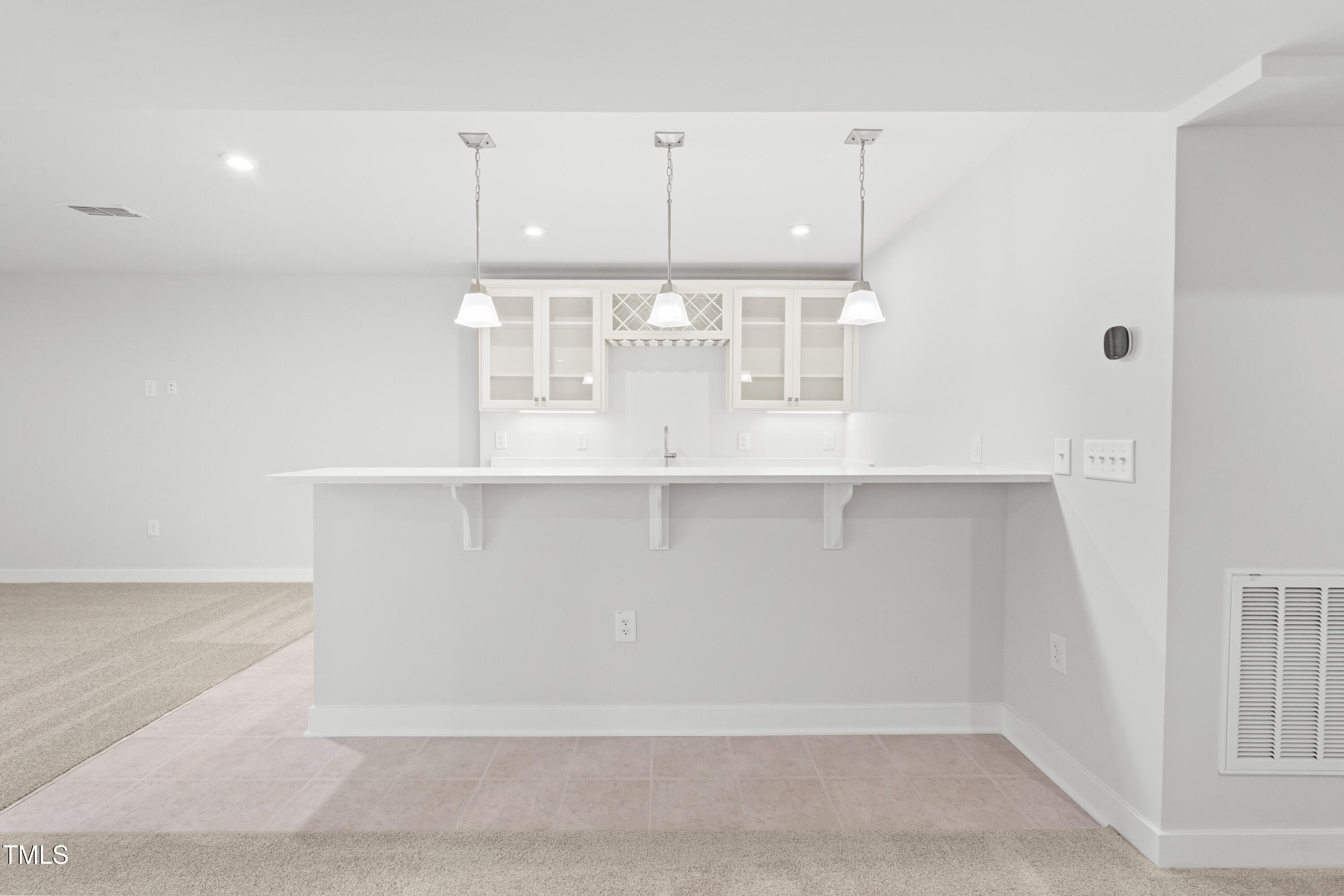 573 Freedom Trail Drive Willow Spring, NC 27592 - Photo 28 of 37 a view of kitchen with granite countertop cabinets and sink
