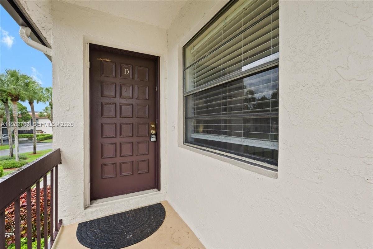 7944 Eastlake Drive, Unit D Boca Raton, FL 33433 - Photo 4 of 29 a view of entryway with a rug