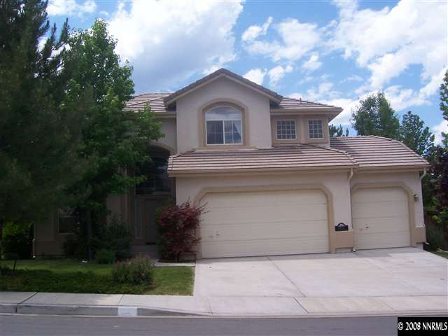 a view of house and outdoor space with yard