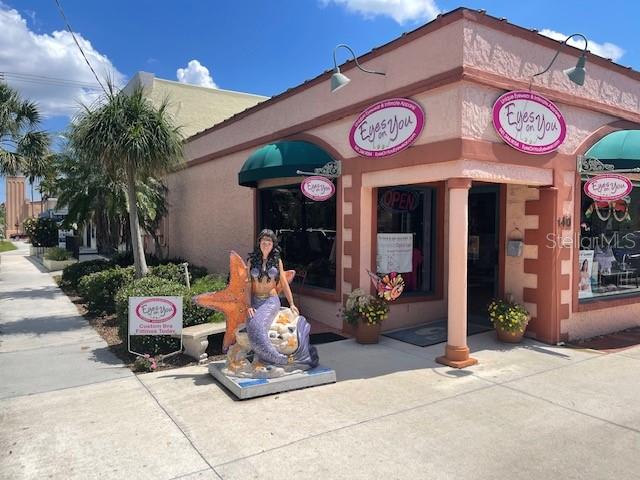 20080 Ragazza Circle, Unit 102 Venice, FL 34293 - Photo 47 of 49 a view of a store with an outdoor space