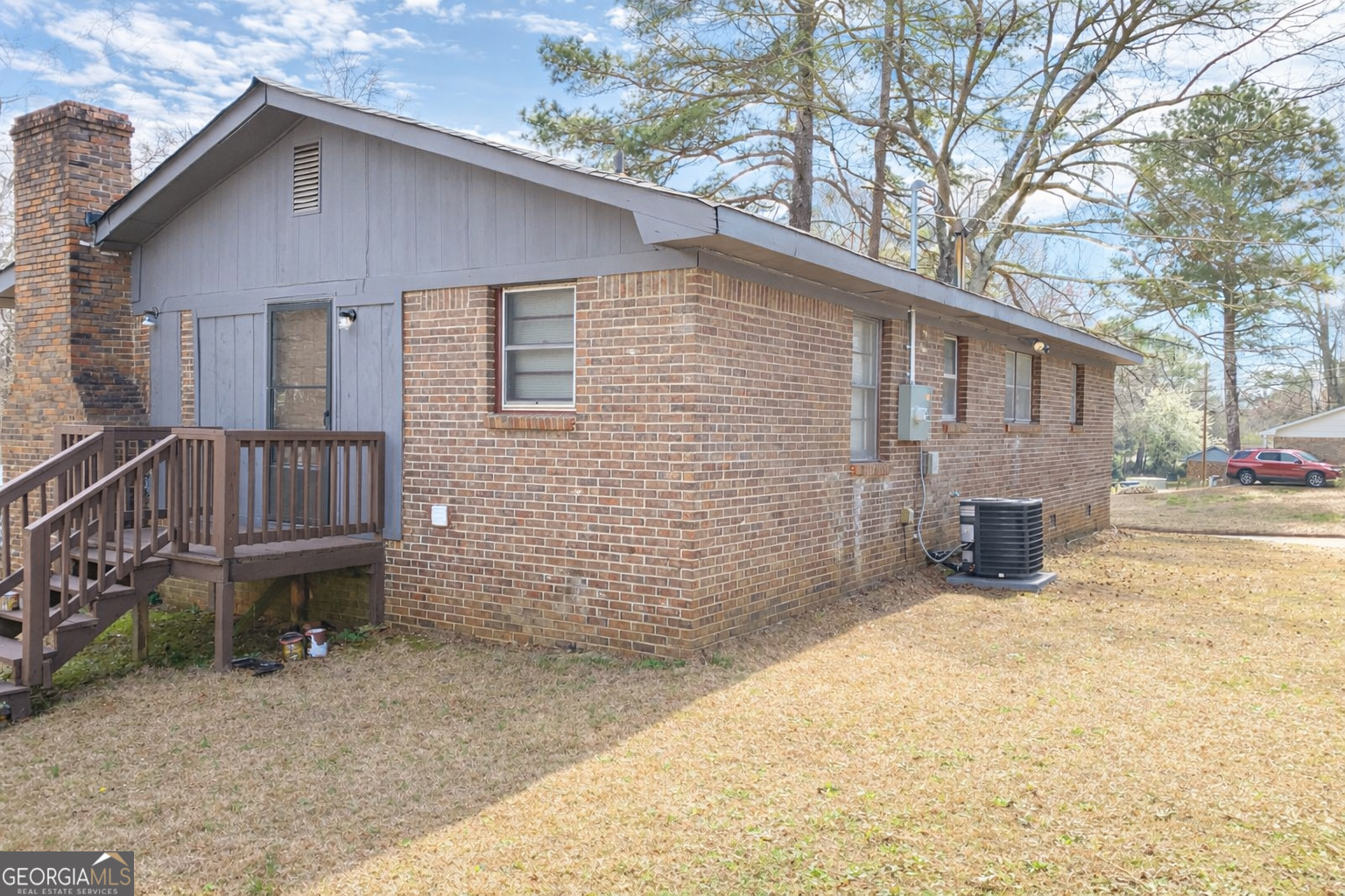 10167 Waterford Road Northeast Covington, GA 30014 - Photo 2 of 9 a view of a house with a yard and wooden fence