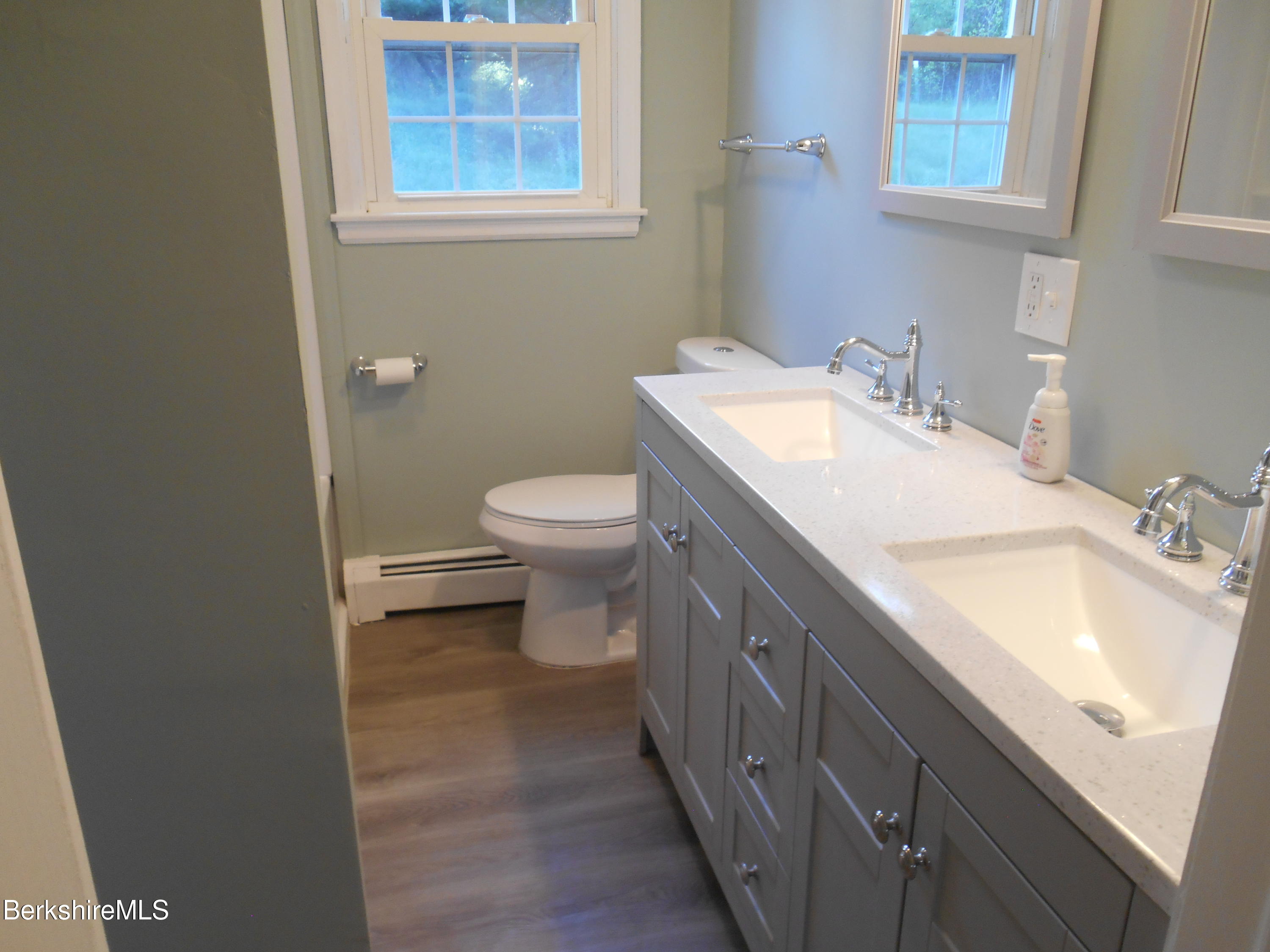 238 Swamp Road Richmond, MA 01201 - Photo 12 of 21 a bathroom with a sink toilet and mirror