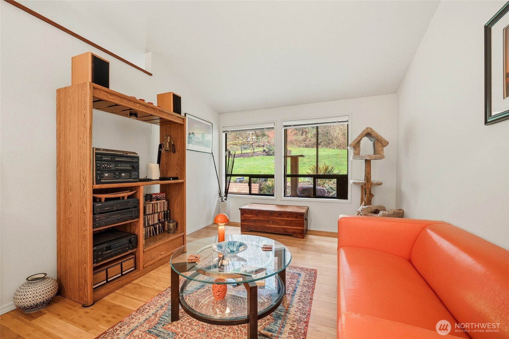 6830 Norma Beach Road Edmonds, WA 98026 - Photo 11 of 30 a living room with furniture and a floor to ceiling window