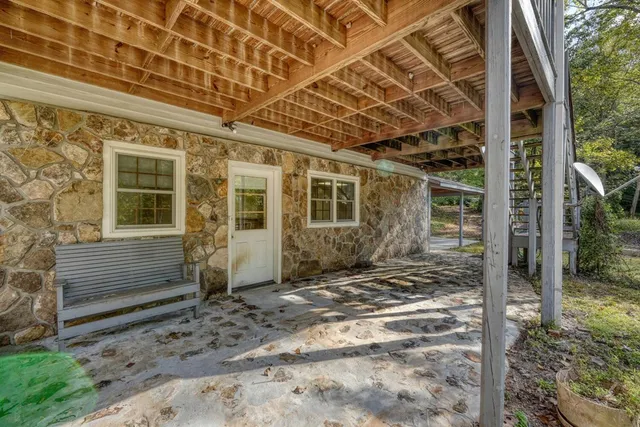 a view of a porch with garden