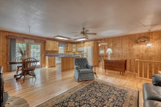 a living room with furniture and a table