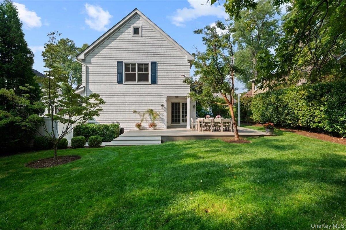23 Fairlawn Street Rye, NY 10580 - Photo 29 of 38 The back of the property is entirely fenced in and surrounded by mature privacy trees.