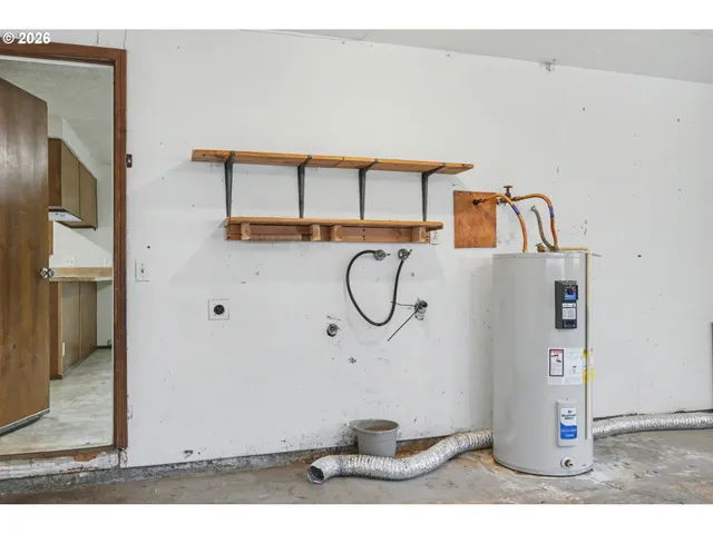 a view of a backyard of the house