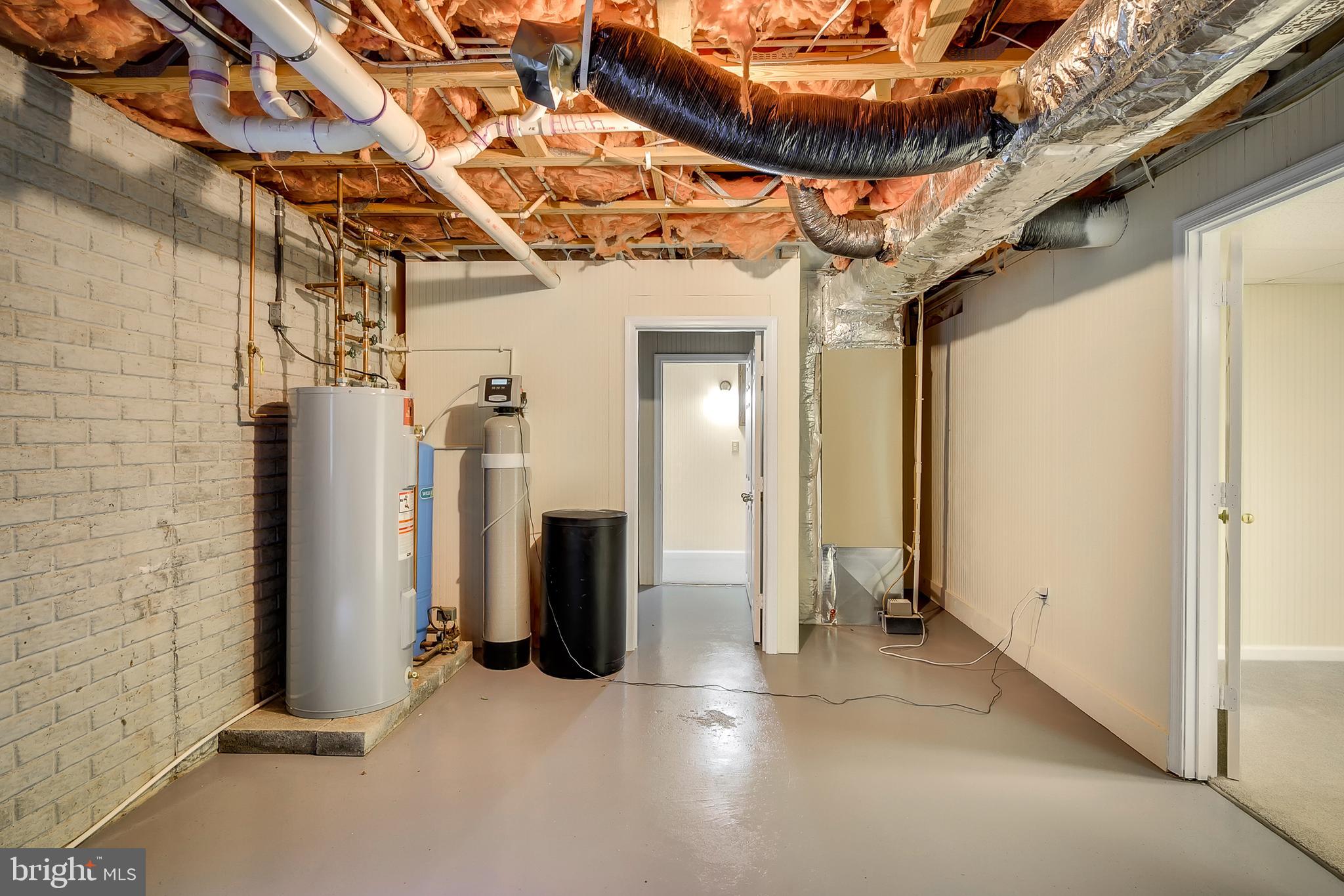 1504 New Hope Road Cross Junction, VA 22625 - Photo 28 of 35 a view of a storage room with hallway