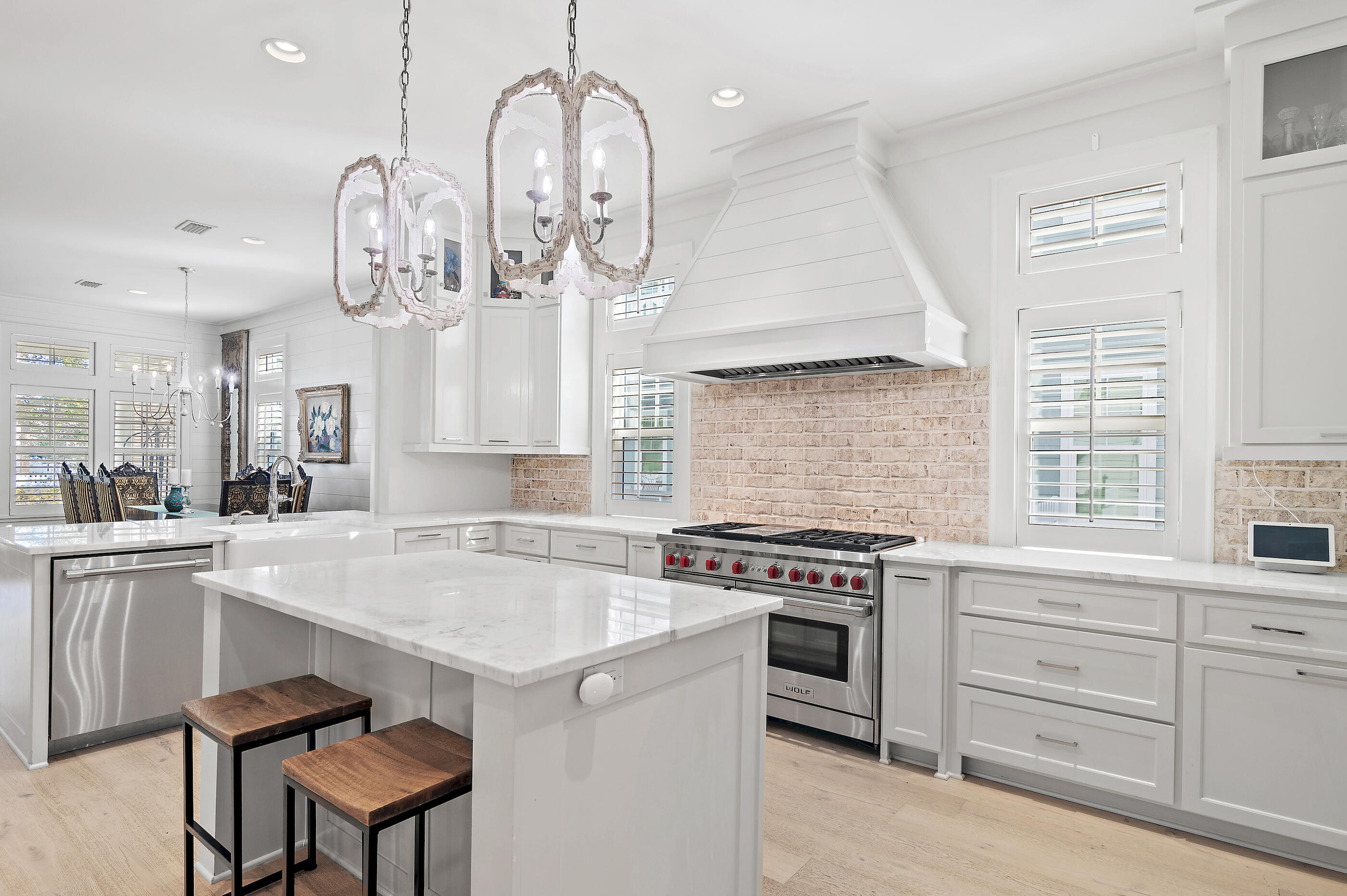 an open kitchen with a table and chairs in it