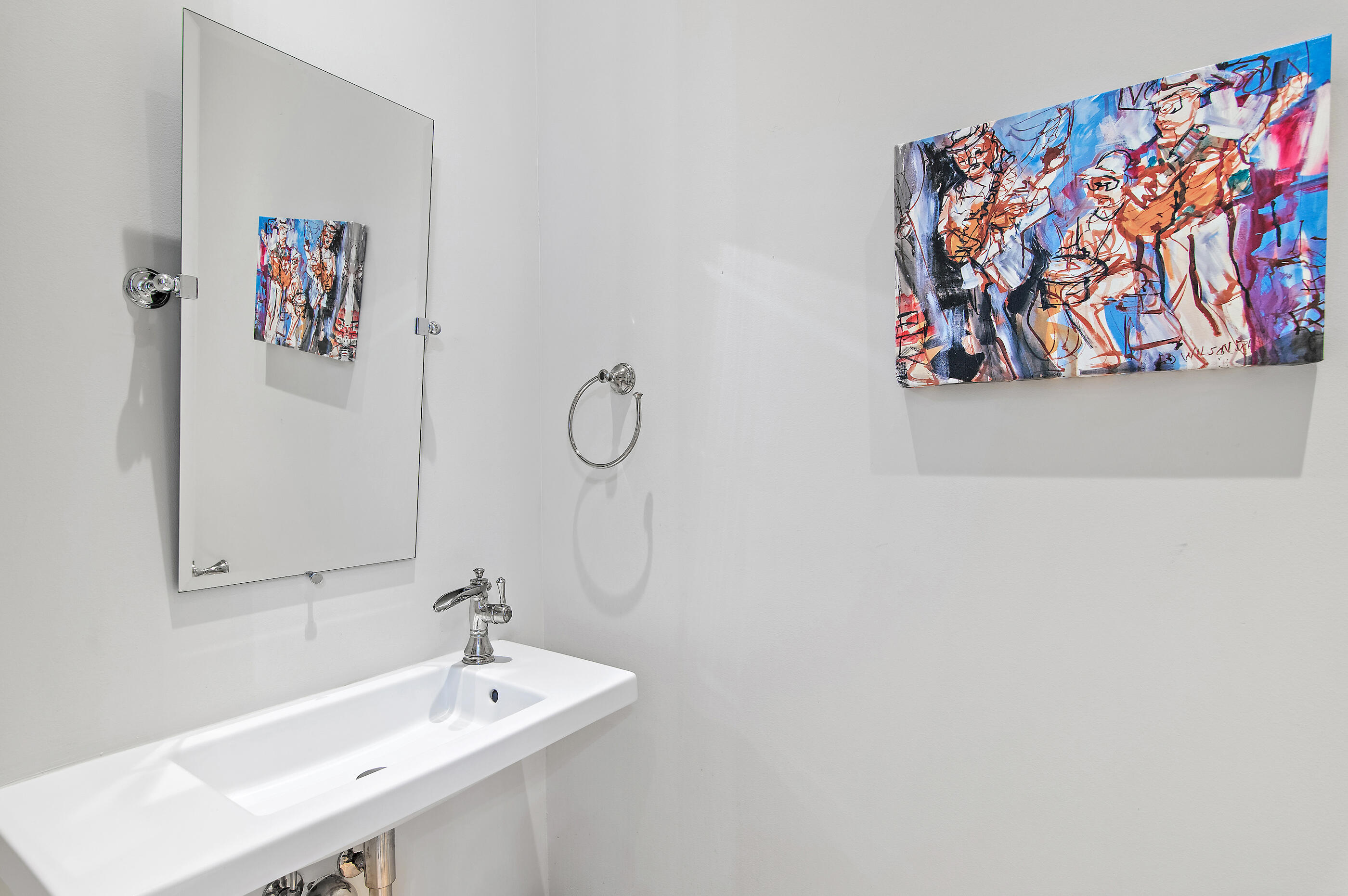 259 Moonlit Way Destin, FL 32541 - Photo 24 of 51 a bathroom with a sink and a mirror