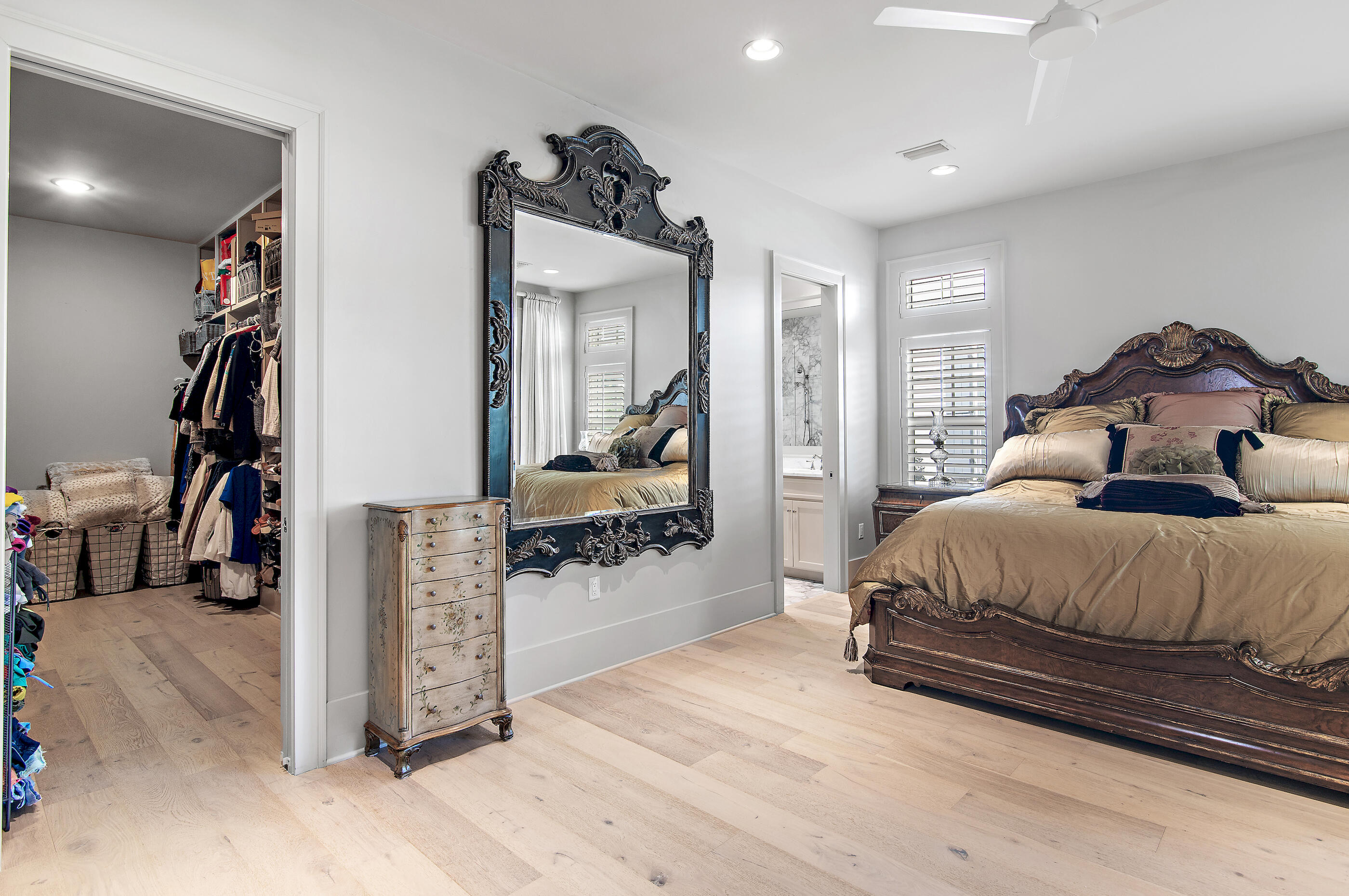 259 Moonlit Way Destin, FL 32541 - Photo 27 of 51 a bedroom with a bed and a walk in closet