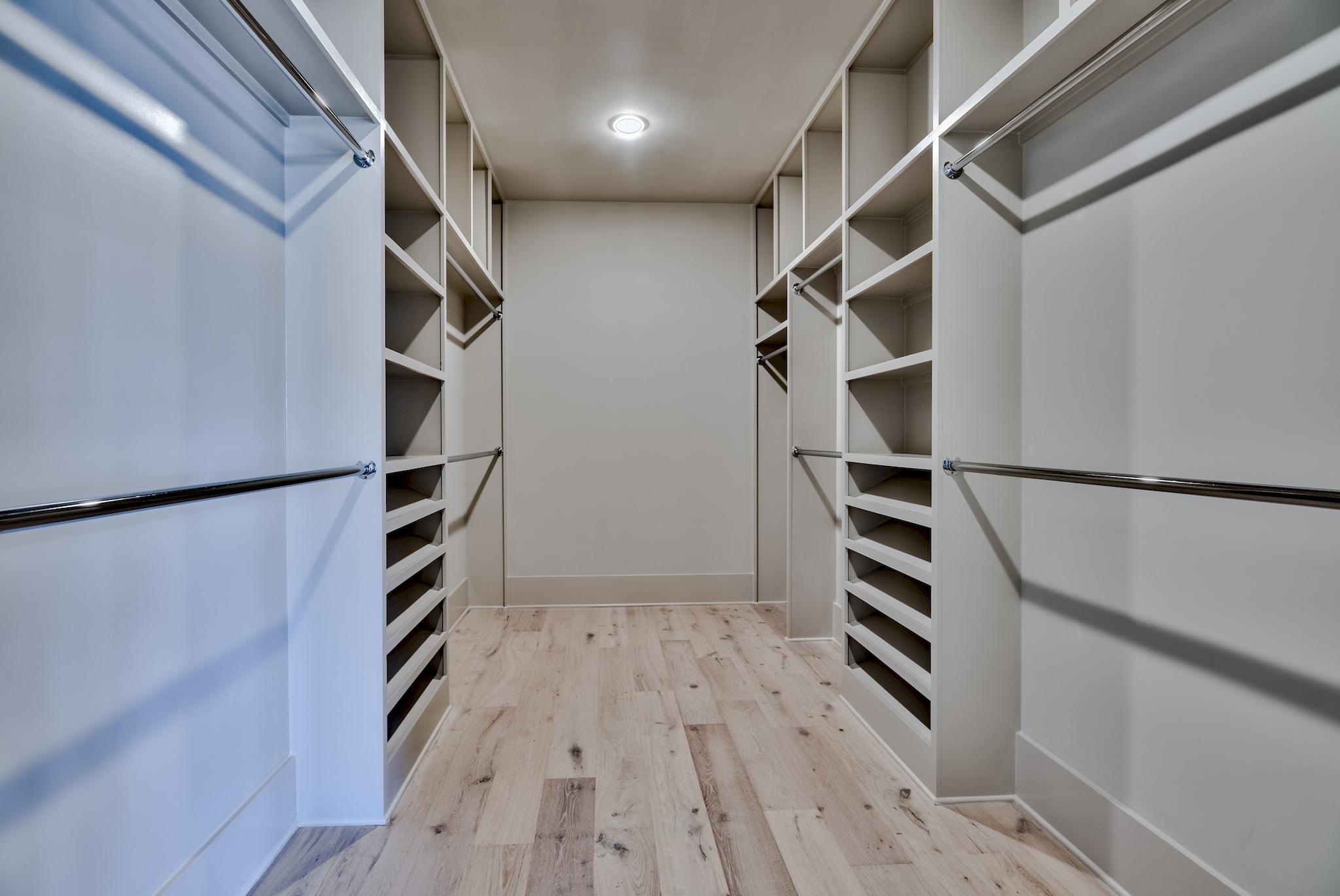 259 Moonlit Way Destin, FL 32541 - Photo 28 of 51 an empty walk in closet with wooden floor