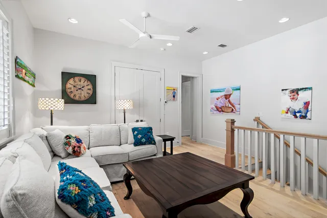 a living room with furniture and a table